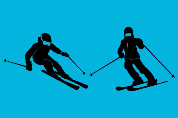 zwei Skifahrer in schwarzer Silhouette auf orangem Hintergrund